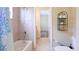 Bright bathroom with a tiled shower at 7081 Grassland Ct, Sarasota, FL 34241