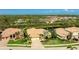 Beautiful exterior view of the home showcasing its pristine landscaping and serene surroundings at 7081 Grassland Ct, Sarasota, FL 34241