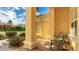 Inviting front porch with rocking chairs, perfect for relaxing and enjoying the neighborhood view at 7081 Grassland Ct, Sarasota, FL 34241