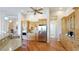 Bright and airy kitchen featuring custom wood cabinetry, stainless steel appliances, and a granite countertop at 7081 Grassland Ct, Sarasota, FL 34241