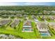Desirable neighborhood featuring well-maintained homes, lush landscaping, and backyard pools, all backing to a beautiful forest at 7410 61 E St, Palmetto, FL 34221