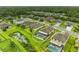 Beautiful aerial view of a single Gathering home with a screened pool and fenced yard at 7410 61 E St, Palmetto, FL 34221