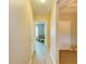 Hallway leads to a peaceful seating area and provides access to other rooms at 7410 61 E St, Palmetto, FL 34221