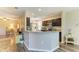 A kitchen with stainless steel appliances, granite countertops and dark cabinetry at 7410 61 E St, Palmetto, FL 34221