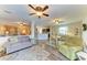 Open living space featuring a ceiling fans, and an open concept dining area and kitchen at 7410 61 E St, Palmetto, FL 34221