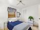 Bedroom displaying neutral walls, a bed, and a storage cabinet at 7615 17Th W Ave, Bradenton, FL 34209