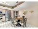 A cozy breakfast nook in the kitchen area has stainless appliances, with upper-level décor shelves at 7615 17Th W Ave, Bradenton, FL 34209