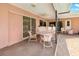 Outdoor patio featuring neutral colored furniture and a ceiling fan, perfect for entertaining guests at 7615 17Th W Ave, Bradenton, FL 34209