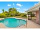 Backyard pool offering privacy and a relaxing retreat at 7615 17Th W Ave, Bradenton, FL 34209