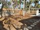 View of the backyard and wooden fence with some trees at 782 Birdsong Ln, Sarasota, FL 34242