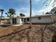 View of the backyard and side of the property with trees at 782 Birdsong Ln, Sarasota, FL 34242