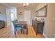 Inviting dining area with ample room for seating and a view into other living spaces at 8725 Aero Ave, North Port, FL 34287