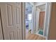 Hallway showing bedroom and bathroom access at 8725 Aero Ave, North Port, FL 34287