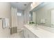 Well-lit bathroom with walk-in shower, modern fixtures and light toned walls at 909 Crosswind Ave, Sarasota, FL 34240