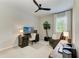 Bedroom featuring desk area, ceiling fan, and natural light at 909 Crosswind Ave, Sarasota, FL 34240