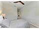 Neutral bedroom featuring a bed with a modern ceiling fan above at 909 Crosswind Ave, Sarasota, FL 34240