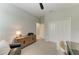 Bedroom featuring a storage console with a view into a hallway at 909 Crosswind Ave, Sarasota, FL 34240