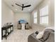 Neutral toned bedroom featuring a modern ceiling fan and view filled windows at 909 Crosswind Ave, Sarasota, FL 34240