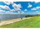 Picturesque lake view from this property offering a serene and scenic backdrop at 909 Crosswind Ave, Sarasota, FL 34240