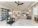 Spacious living room showcases open layout, stylish furniture, modern decor, and natural light at 909 Crosswind Ave, Sarasota, FL 34240