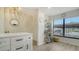 Bright breakfast nook features a large window and white cabinetry for storage at 946 N Beneva Rd # V26, Sarasota, FL 34232