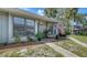 Well-maintained home with a welcoming porch and beautifully landscaped surroundings at 946 N Beneva Rd # V26, Sarasota, FL 34232