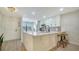 Beautiful kitchen with a large island, modern appliances, and ample counter space at 946 N Beneva Rd # V26, Sarasota, FL 34232