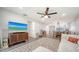 Inviting living room with modern entertainment setup and connected dining area at 946 N Beneva Rd # V26, Sarasota, FL 34232