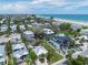 Residential neighborhood with beautiful blue water and a sandy beach at 109 Maple Ave, Anna Maria, FL 34216