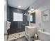 Modern bathroom featuring a sleek glass shower, stylish vanity, and contemporary design elements at 109 Maple Ave, Anna Maria, FL 34216