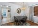 Charming dining area featuring stylish lighting, comfortable seating, and an inviting atmosphere at 109 Maple Ave, Anna Maria, FL 34216