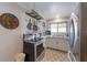Well-equipped kitchen boasting modern appliances, ample counter space, and stylish decor accents at 109 Maple Ave, Anna Maria, FL 34216