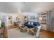 Comfortable living room with stylish decor, hardwood floors, and an inviting open floor plan at 109 Maple Ave, Anna Maria, FL 34216