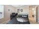 Bedroom boasts natural light, work station, and neutral color scheme at 12708 Aquamarine Ave, Bradenton, FL 34211