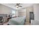 Bright bedroom featuring a built-in wardrobe easily transforming into a bed, perfect for a versatile space at 12708 Aquamarine Ave, Bradenton, FL 34211