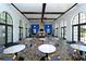 Spacious clubhouse with multiple seating areas, a fireplace, and large windows for natural light at 12708 Aquamarine Ave, Bradenton, FL 34211