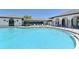 Expansive community pool with ample seating, perfect for enjoying the Florida sunshine at 12708 Aquamarine Ave, Bradenton, FL 34211