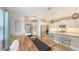 Charming kitchen and dining area with modern stainless steel appliances and stylish pendant lighting at 12708 Aquamarine Ave, Bradenton, FL 34211