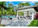 Community pool with an outdoor kitchen offers an excellent space for relaxation and entertaining at 12708 Aquamarine Ave, Bradenton, FL 34211