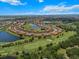 Aerial view of homes, a golf course and lakes in a residential community at 13810 Messina Loop # 202, Bradenton, FL 34211