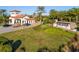 Elegant community entrance with manicured landscaping and stone signage at 13810 Messina Loop # 202, Bradenton, FL 34211