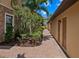 Walkway alongside building showing exterior doors and garden at 13810 Messina Loop # 202, Bradenton, FL 34211