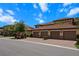 View of garage row with red brick pavers in the driveway at 13810 Messina Loop # 202, Bradenton, FL 34211