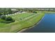 Golf driving range by a lake in a scenic community at 13810 Messina Loop # 202, Bradenton, FL 34211