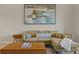 Cozy living room with a comfortable sofa, stylish decor, and lots of natural light at 13810 Messina Loop # 202, Bradenton, FL 34211