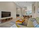 Open living area with seamless flow from the living room to the dining area and kitchen at 13810 Messina Loop # 202, Bradenton, FL 34211