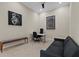 Spacious office featuring tile floors, a ceiling fan, ample seating, and modern decor at 13810 Messina Loop # 202, Bradenton, FL 34211