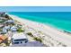 Coastal property with modern architecture and easy access to the white sandy beach and turquoise ocean at 145 50Th St, Holmes Beach, FL 34217