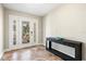 Inviting foyer with tiled floors, decorative mosaic, console table, and bright entry door at 145 50Th St, Holmes Beach, FL 34217