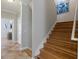 View of a staircase with wood steps, leading to the home's other rooms at 145 50Th St, Holmes Beach, FL 34217